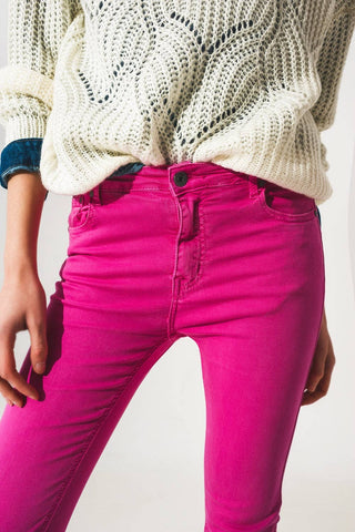 Flare jeans with raw hem edge in fuchsia: Fuchsia / Small