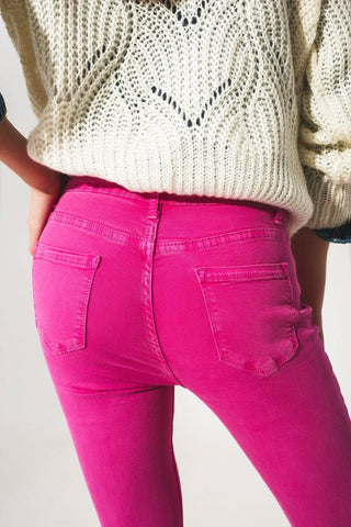Flare jeans with raw hem edge in fuchsia: Fuchsia / Small
